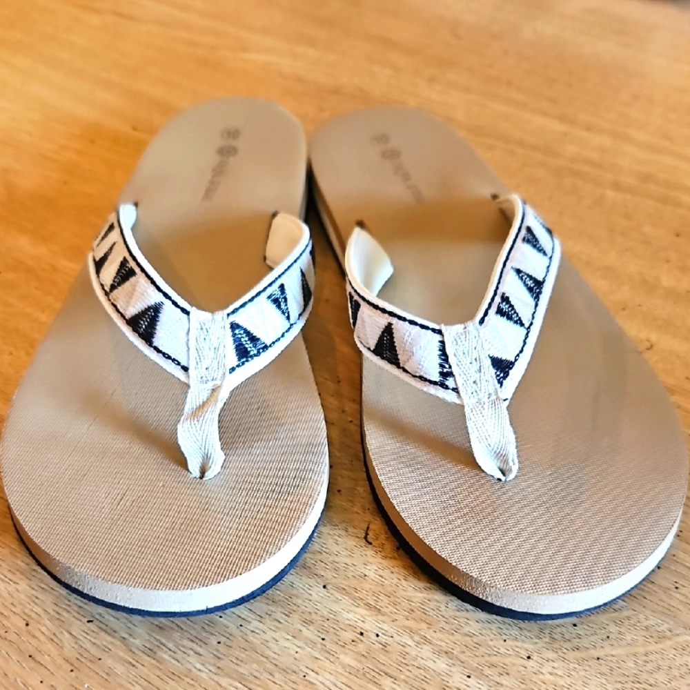 Beige and Black Patterned Flip Flops